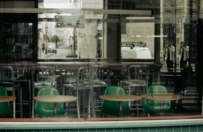 a group of chairs in front of a window